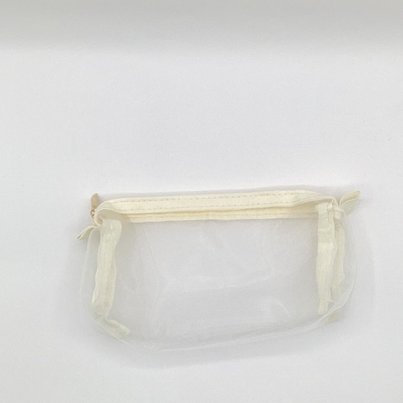 Cream Cosmetic Bag with Smooth Material and Curved Handle - Picture 5 of 10